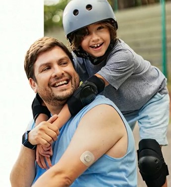 Man and boy with helmet